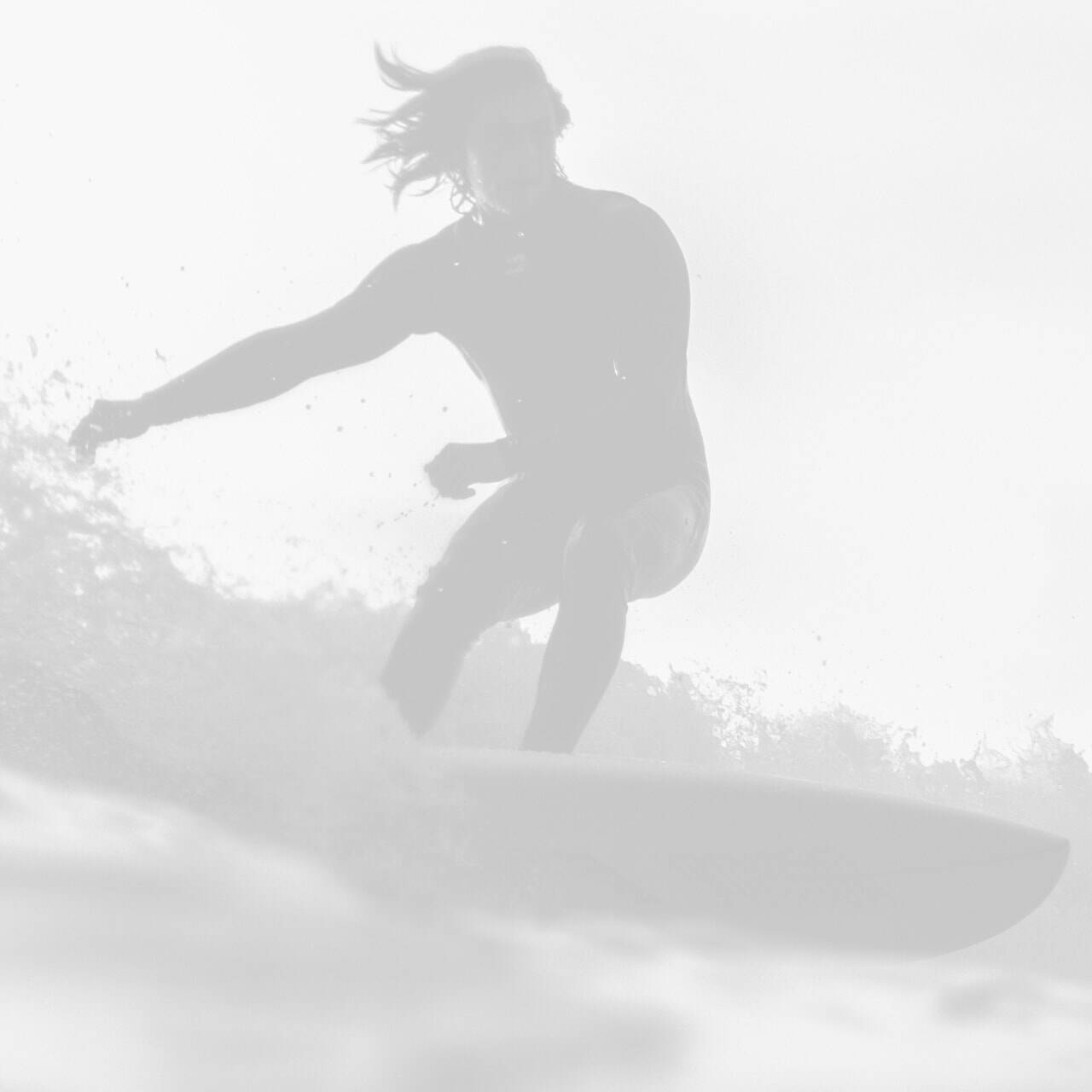 A stylised image of a surfer riding a surfboard on a wave