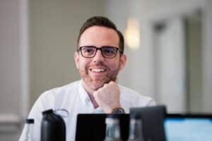 An image of Adam Wood in a meeting looking thoughtful at Hotel du Vin on 01 Jun 2021