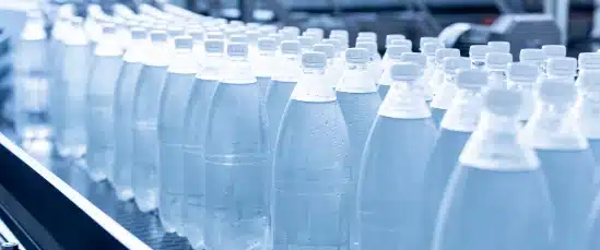 An image of water bottles on a production line.