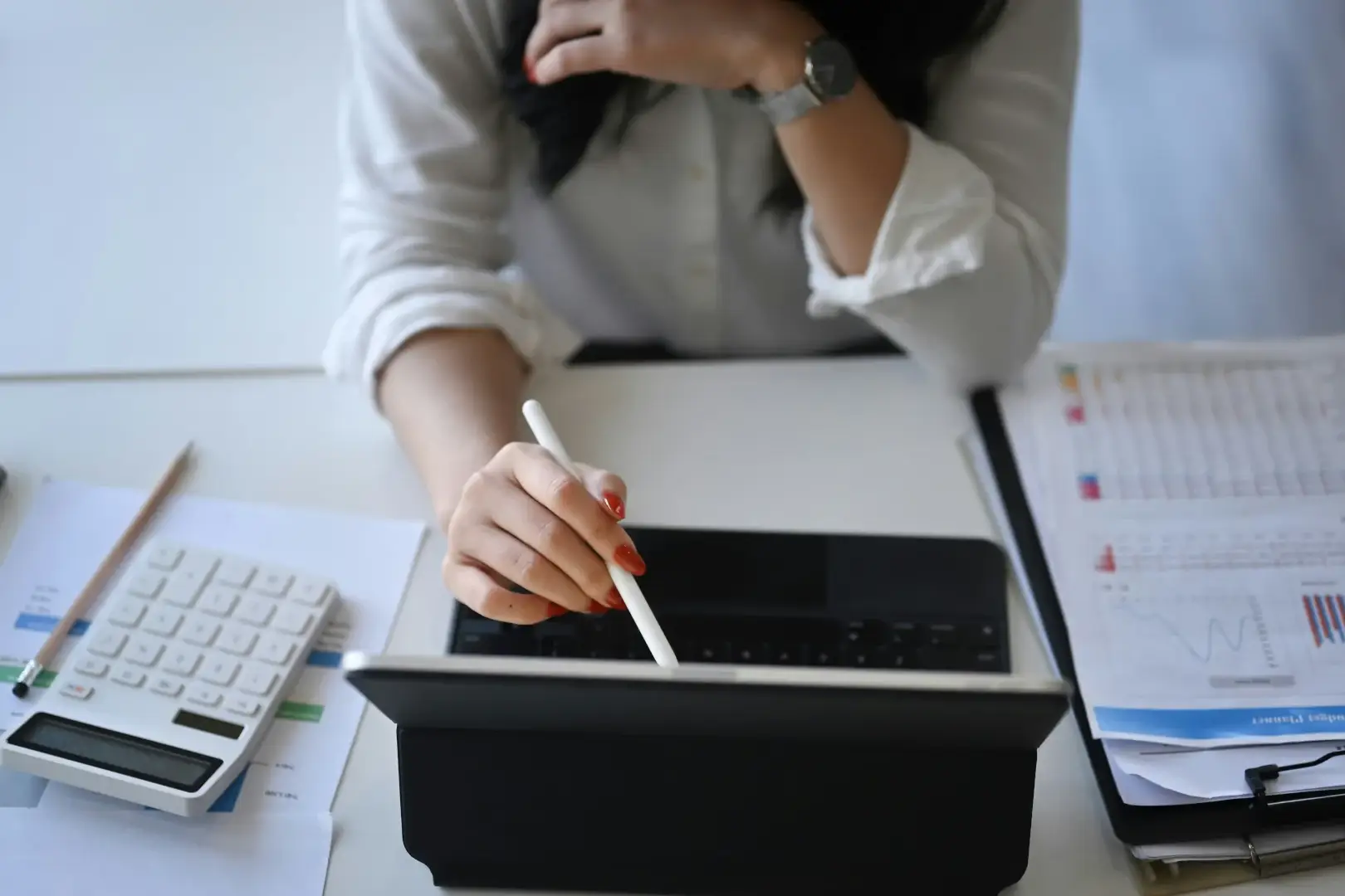 Person on a tablet working