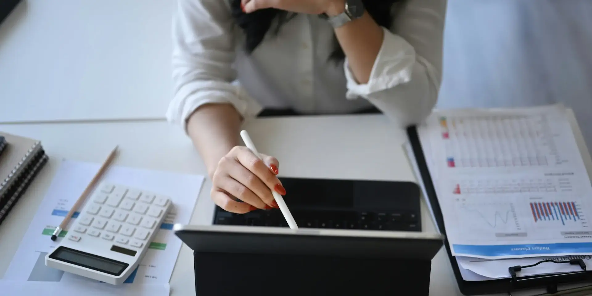 Person on a tablet working