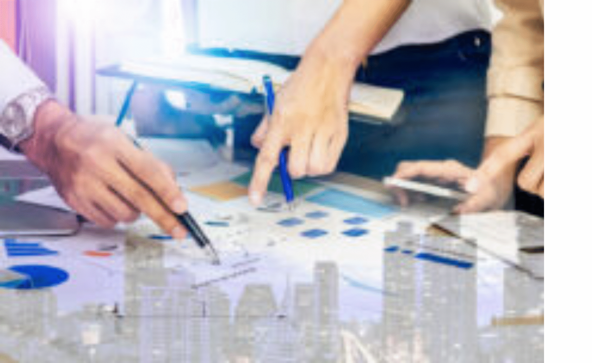 Business team reviewing documents together at a desk.